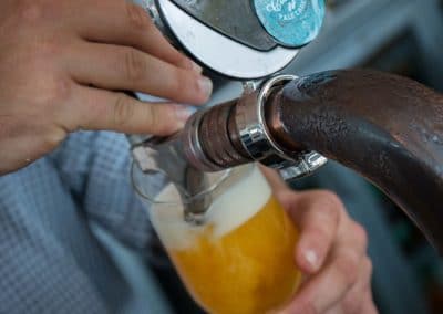 Commercial photography of Six String Brewing Co beer on tap at restaurant